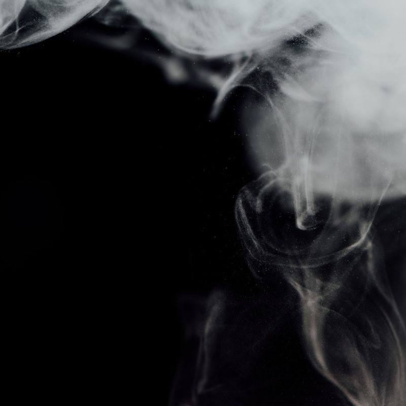 white smoke in black background